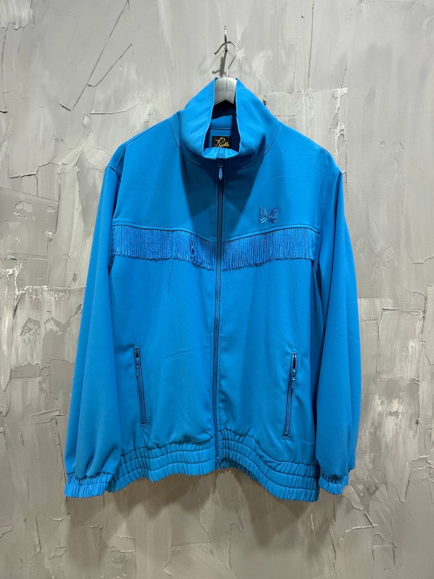 NEEDLES FRINGE TRACK JACKET BLUE