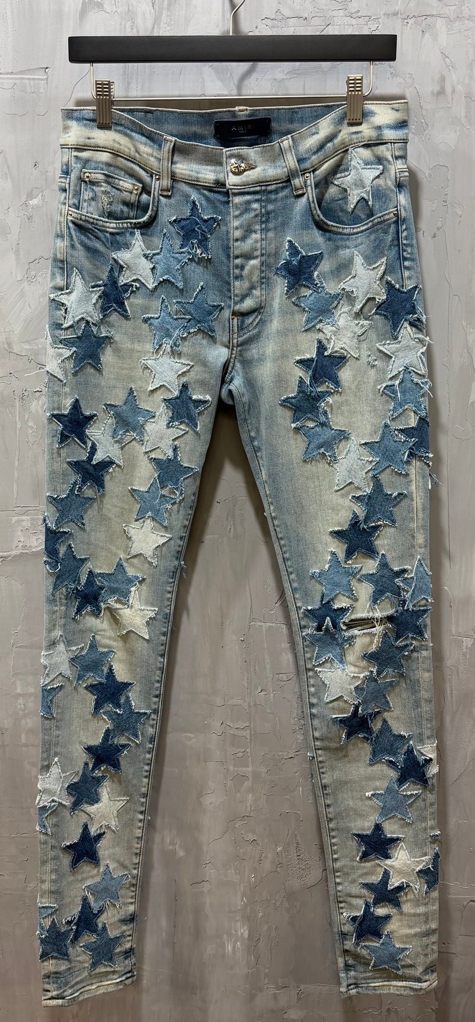 Light wash jeans star patch