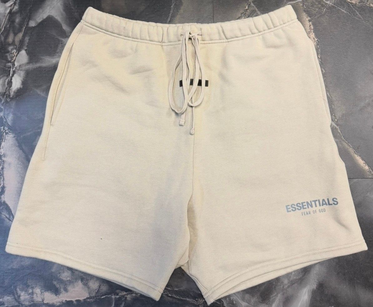 Fear of God Essentials tan shorts