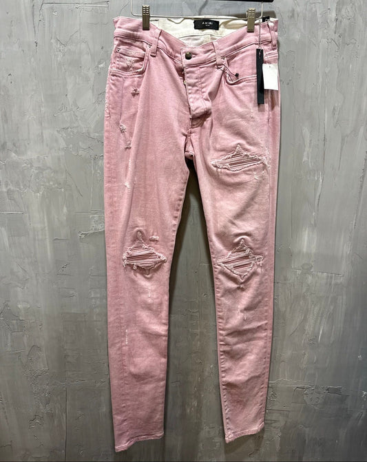 Sprayed pink MX1 denim jeans