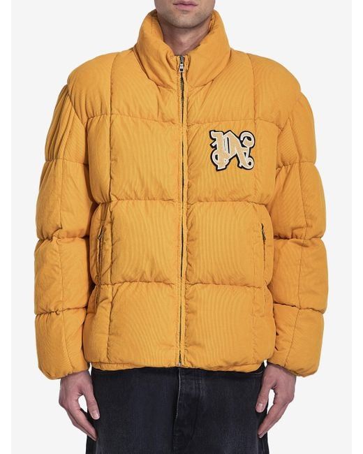 Palm Angels orange monogram corduroy down puffer jacket