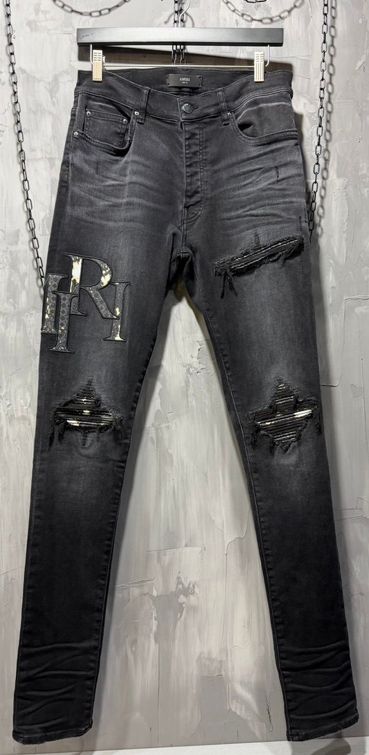 Amiri Staggered Logo Skinny Jeans