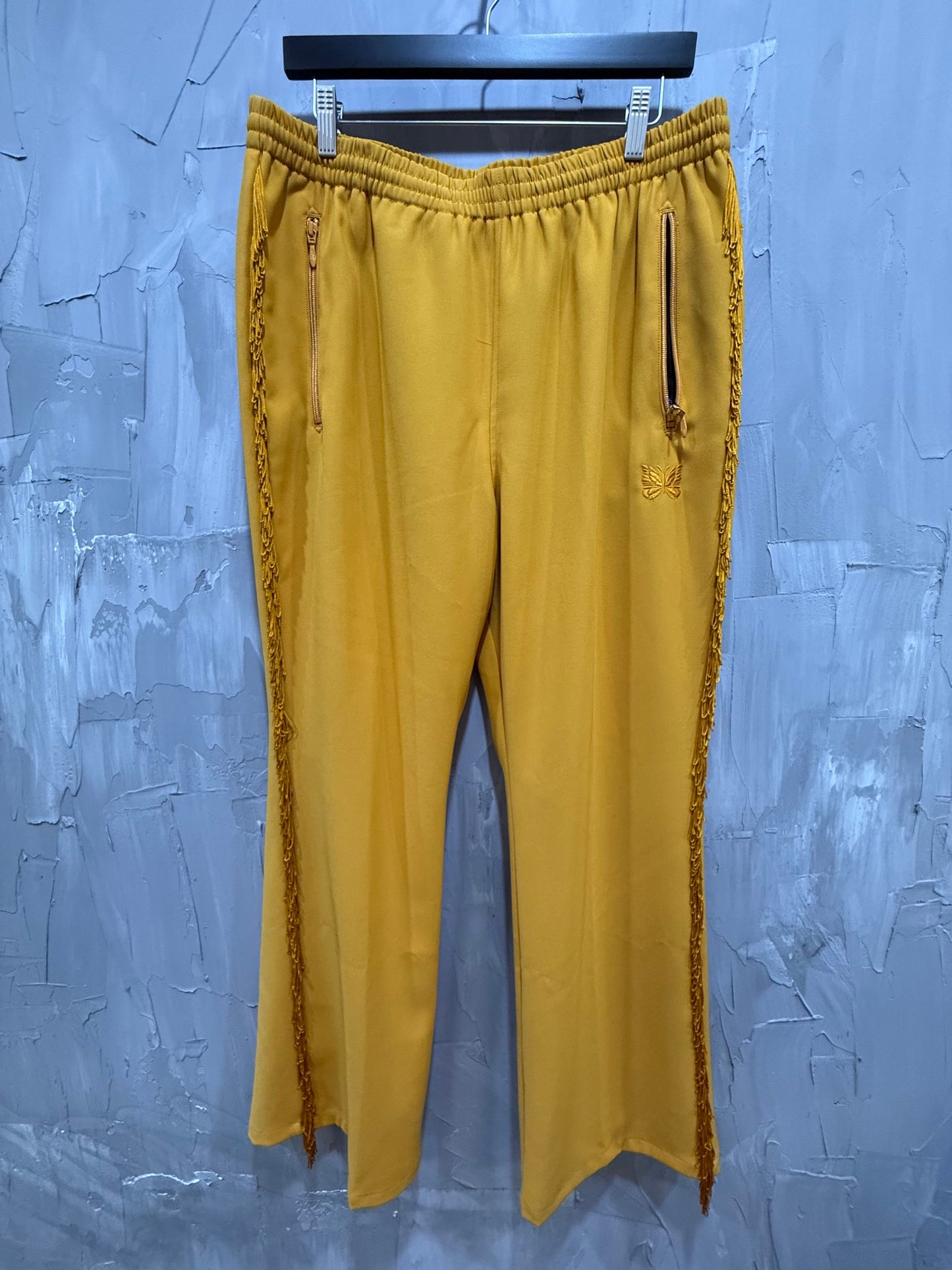 NEEDLES FRINGE TRACK PANTS YELLOW