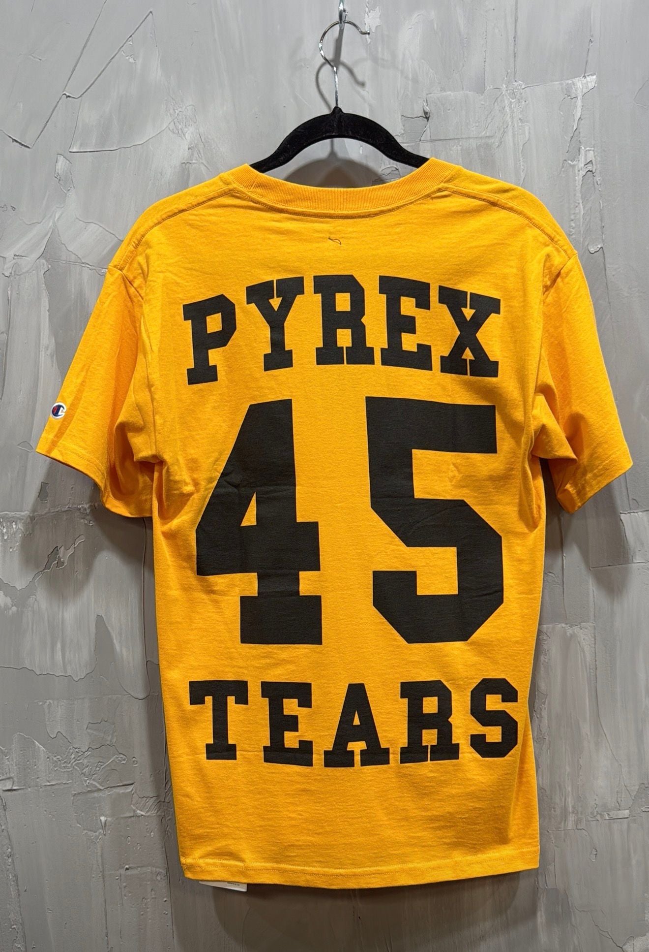 CHAMPIONS X DENIM TEARS PYREX TEARS TEE