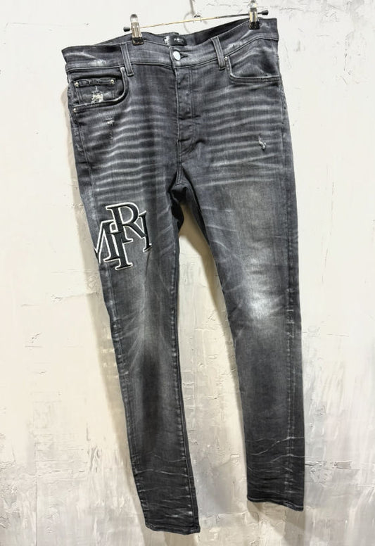 Amiri Varsity Logo Patch Distressed Skinny Jeans - Like New