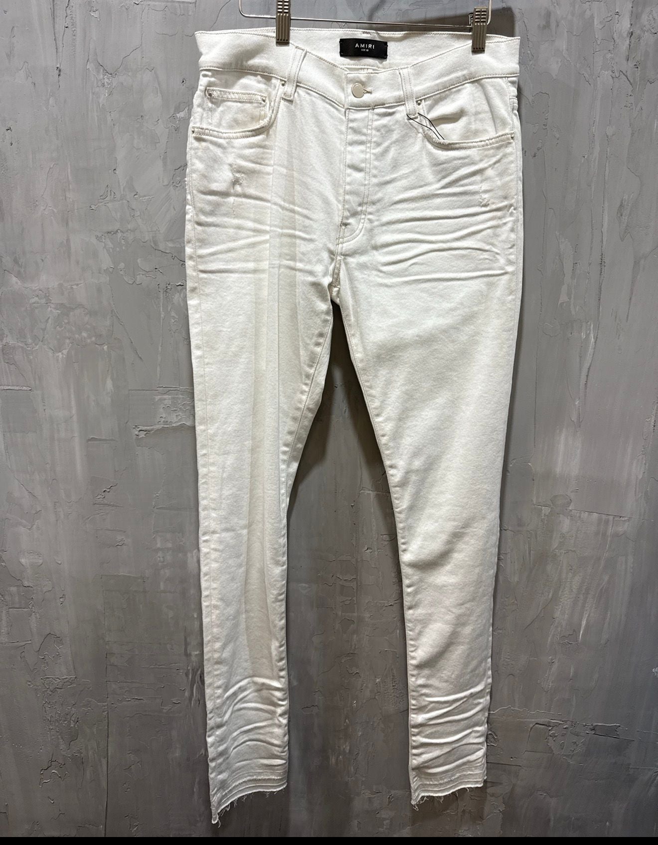 Raw hem skinny jeans white