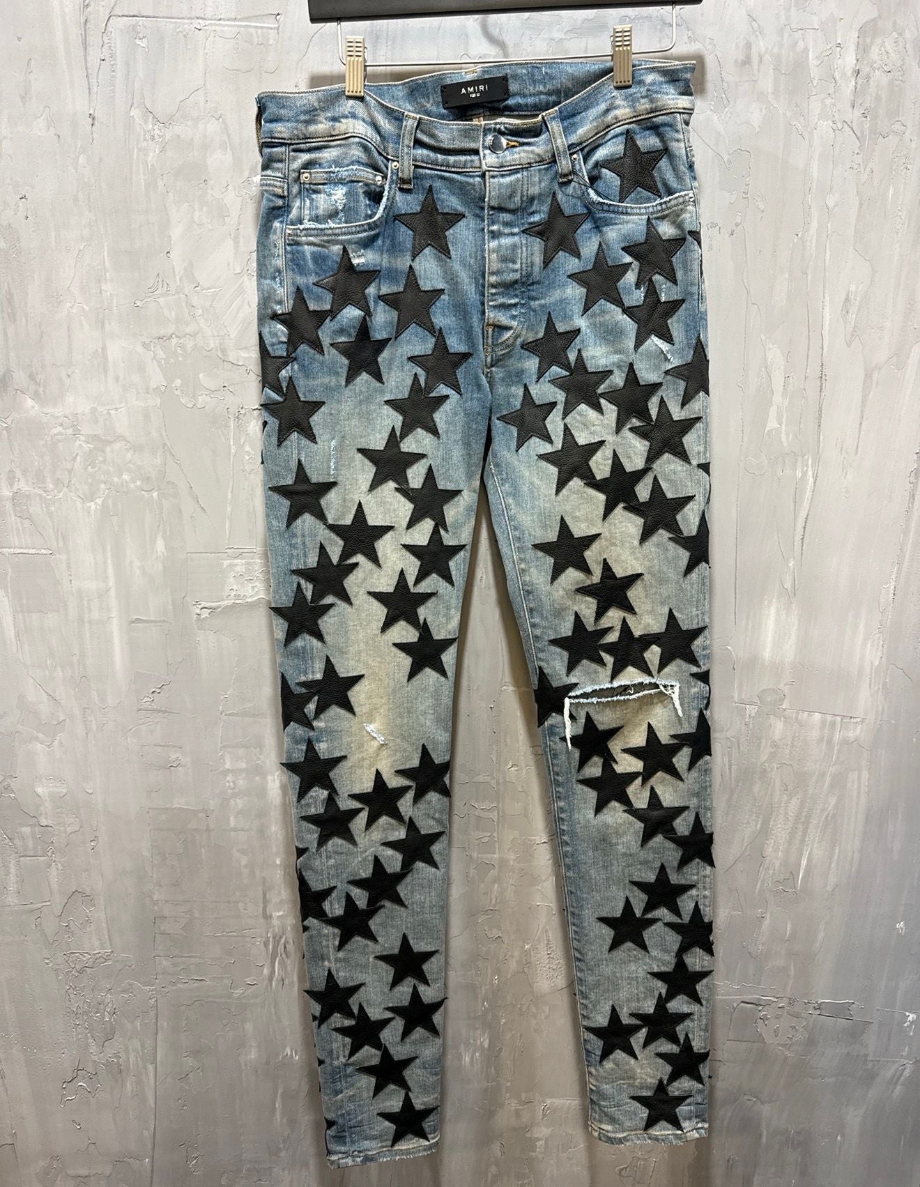 Chemist black leather star jeans