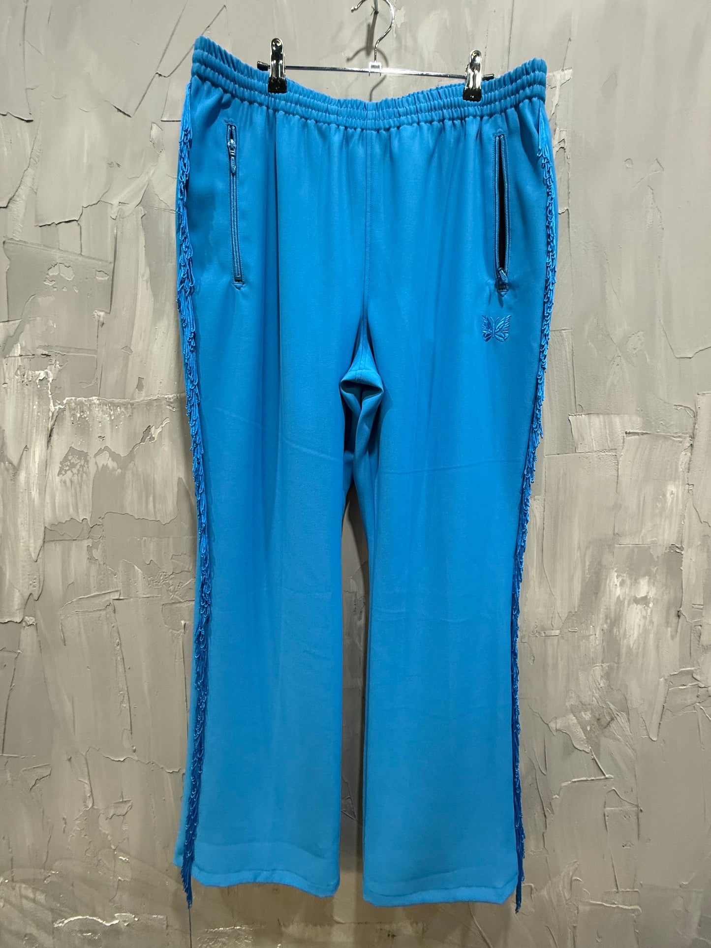 NEEDLES FRINGE TRACK PANTS BLUE
